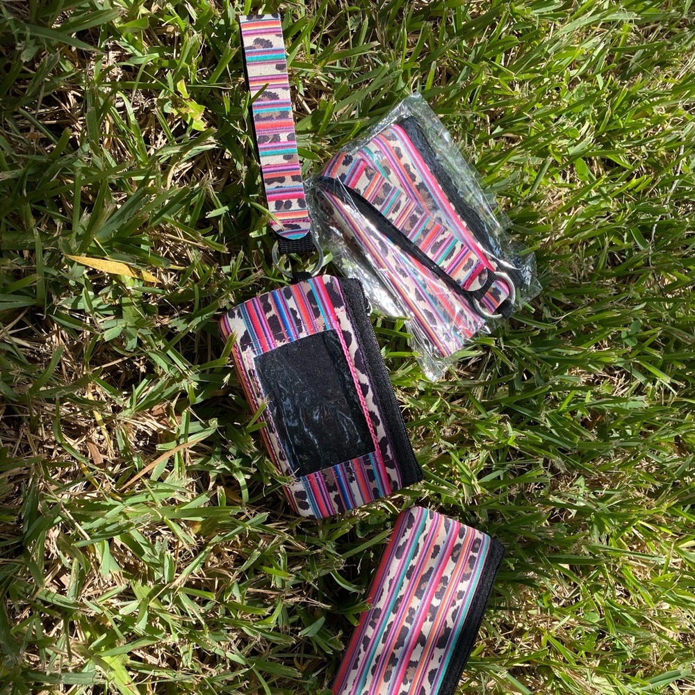 Serape and cheetah wristlet wallets